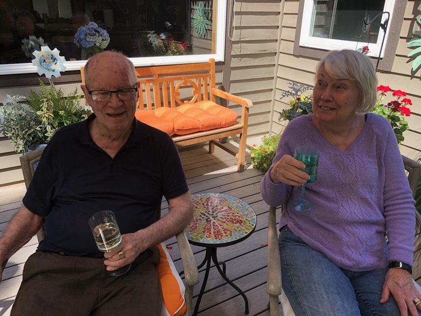 Happy Elder Couple eating snacks